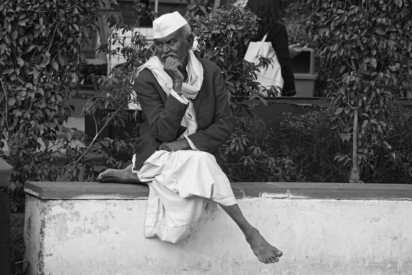 Man sitting on Wall