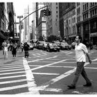 man walking down the street