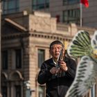 man with chinese kite