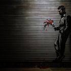 Man with Flowers by Banksy
