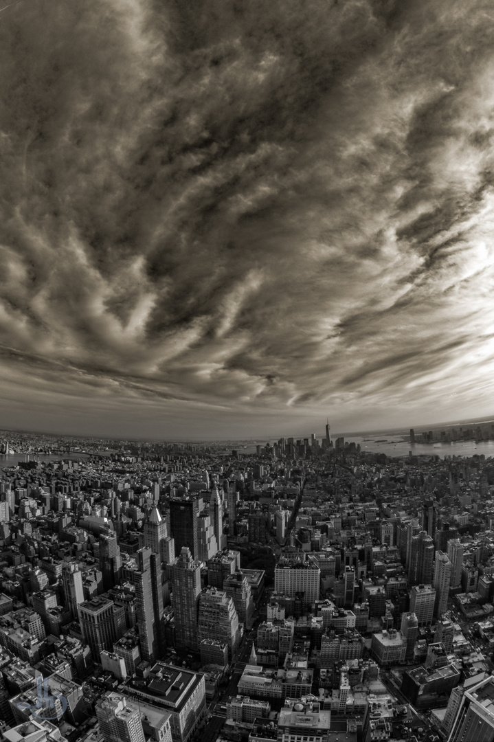 Manhattan beneath cloudy skies