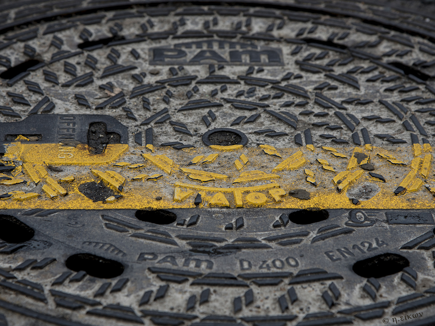 Manhole Cover with yellow Line