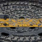 Manhole Cover with yellow Line