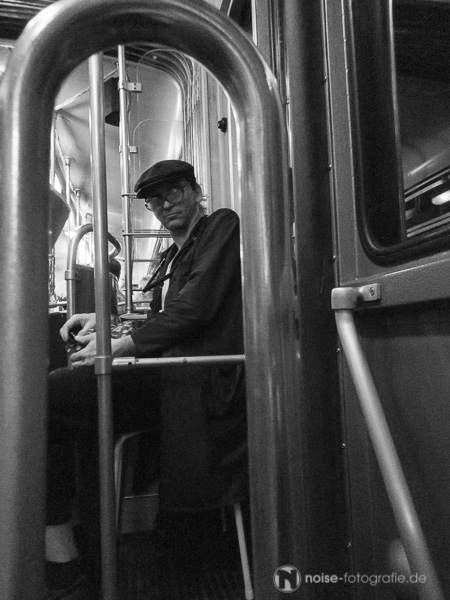 Mann in Strassenbahn / Man in Train
