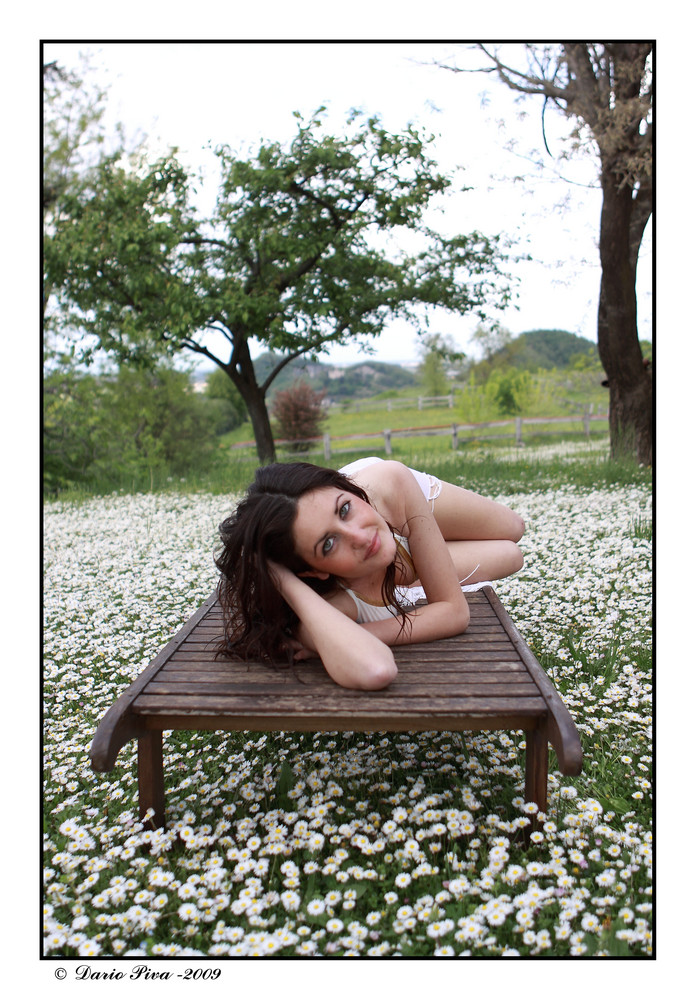 Manuela on carpet of marguerites