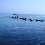 mare adriatico in bonaccia dal moletto  di   pesaro