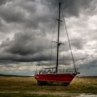 Marée basse et ciel gris,...