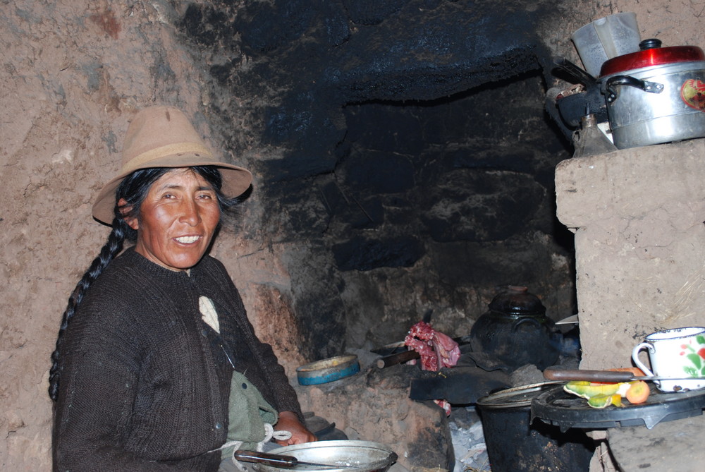 Maria in her kitchen at Puno, Peru, at 3800 meters over sea.....