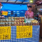 Market vendor selling cane sugar