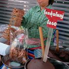 Market woman selling Kapi