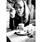 - Marthe having a cup of tea while scanning the place, even without her camera -