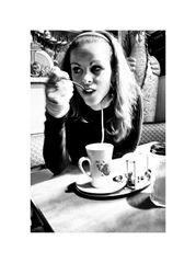 - Marthe having a cup of tea while scanning the place, even without her camera -