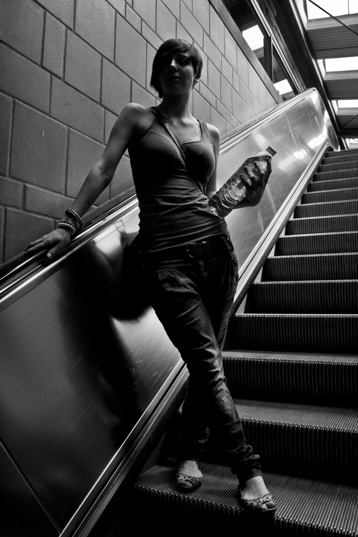 Mary on escalator