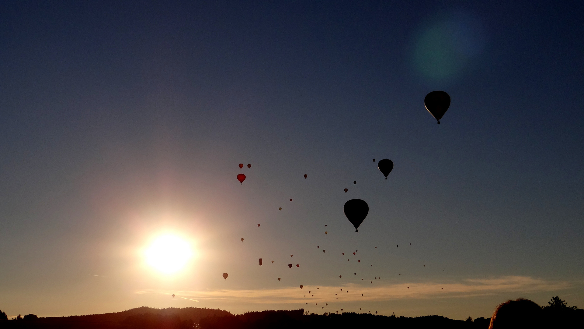 Massenstart im Sonnenuntergang