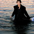 Max with a wet suit in sunset sea ^^