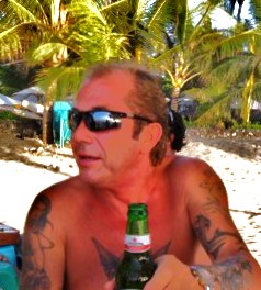 Me having a beer on the beach in Kuta