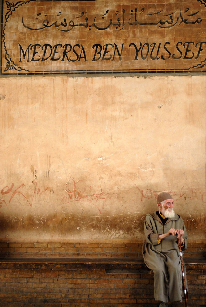 Medersa Ben Youssef - old man sitting