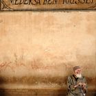 Medersa Ben Youssef - old man sitting