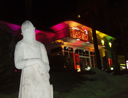 medieval statue combined with litten up casino