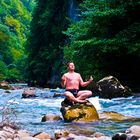 Meditation in the middle of a mountain river