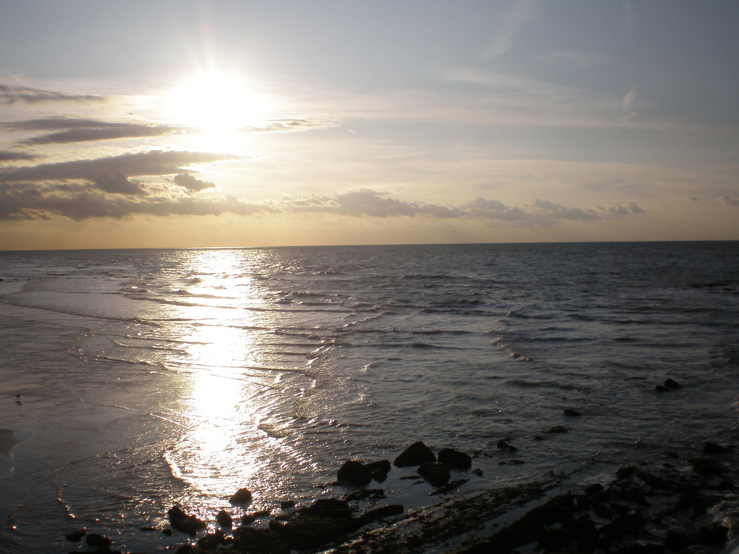 Meeresrauschen im Sonnenuntergang