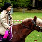 Meine Tochter auf einem Pony