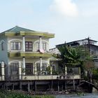 Mekong Delta - Wohnhaus zwischen den Baracken und Booten