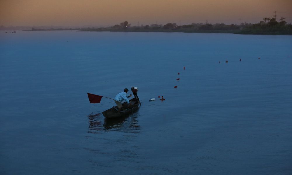 Mekong, Fischer im Sonnenaufgang
