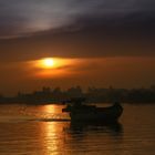 Mekong, Sonnenaufgang mit Boot