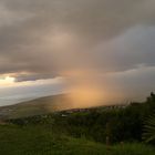 melange de pluie de soleil et d'arc-en-ciel