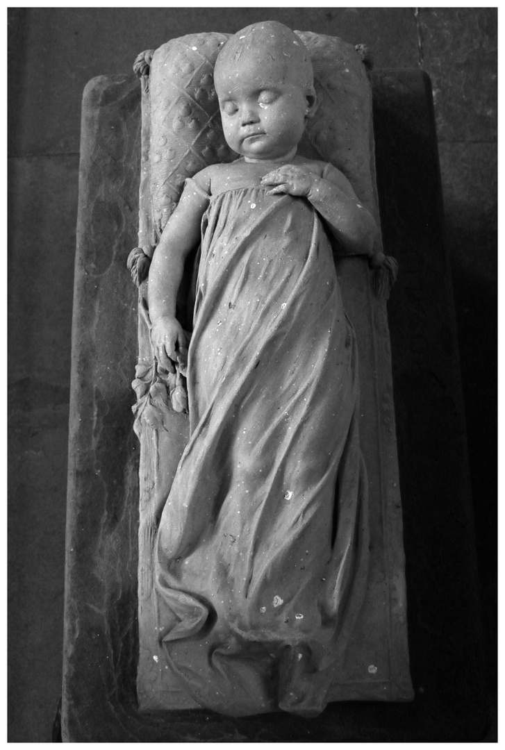 memorial to a dead baby at lanercost