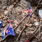 Memorials fixed into the rocks