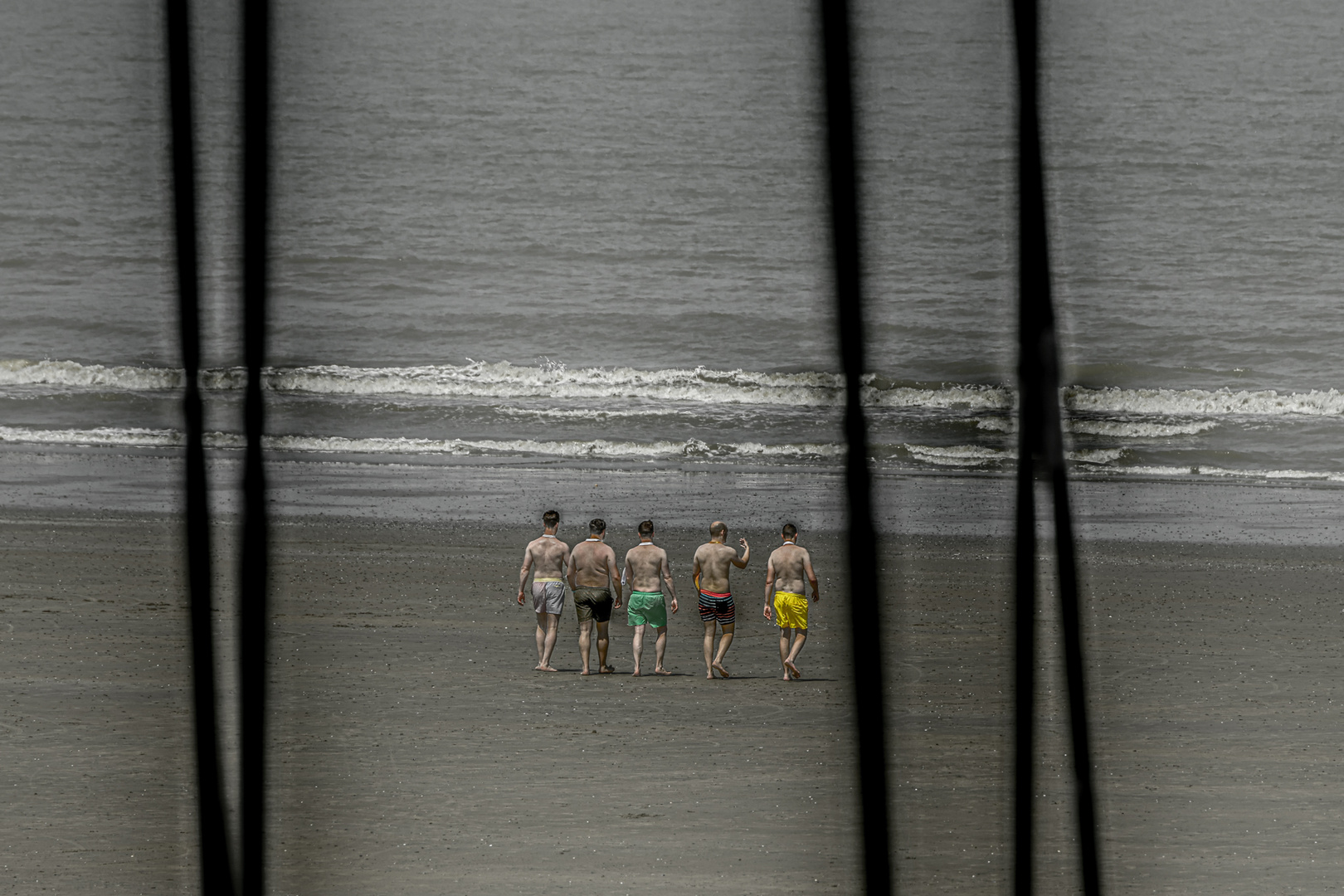 "men at the beach"