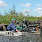 Men at work 46 - water reed cutter