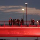 men on a bridge