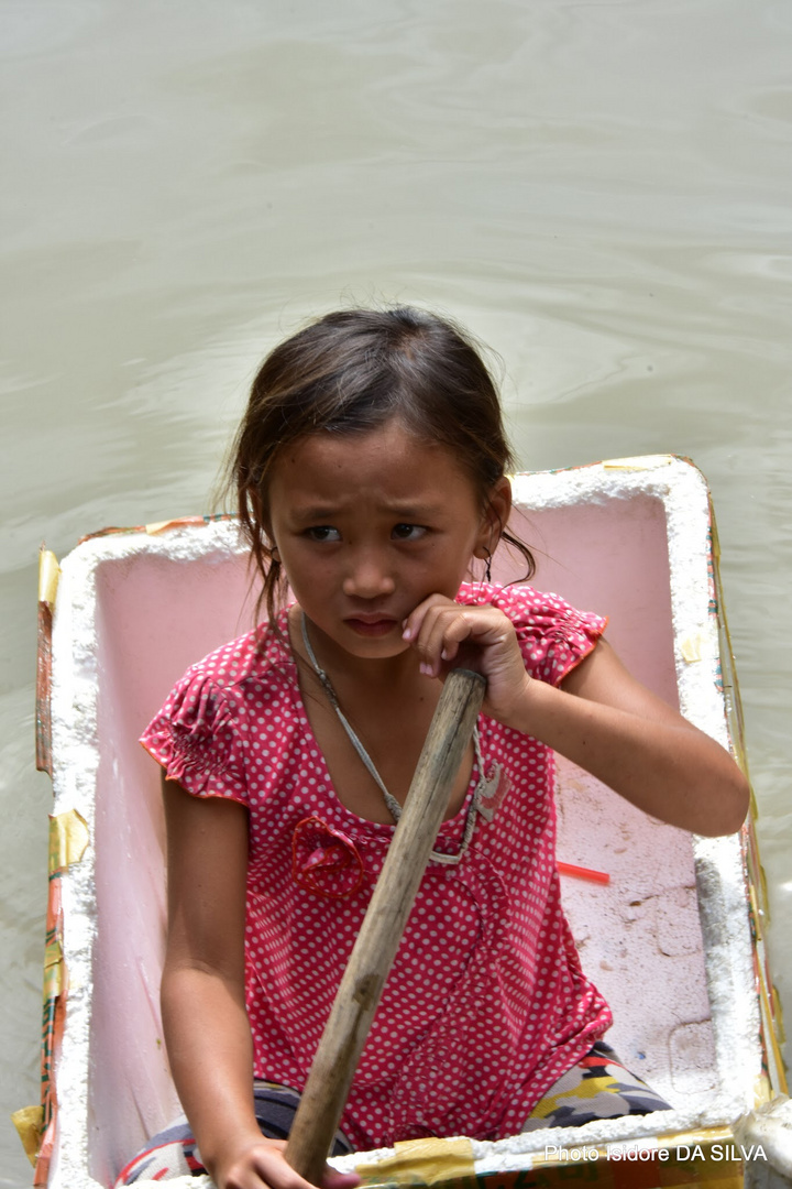 Mendiant village flottant Cambodge 