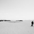 Menschen allein am Strand