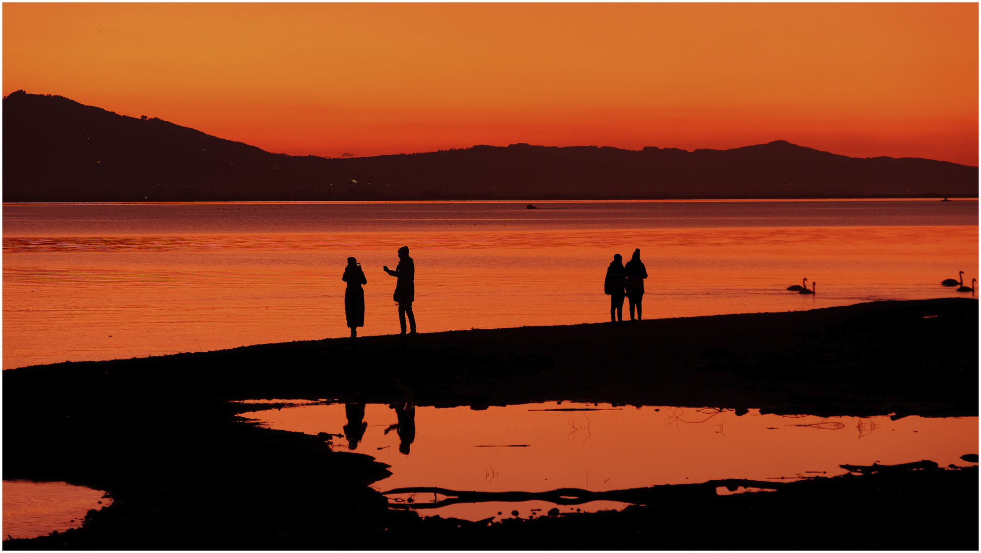 Menschen am See