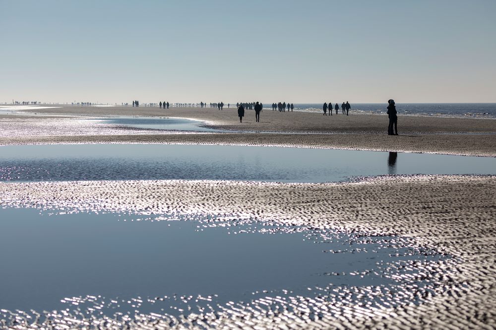 Menschen am Strand