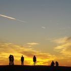 Menschen bei Sonnenuntergang