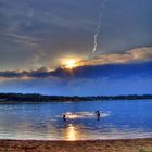 Menschen, Sommerabend und Gewitter