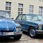 Mercedes-Benz W114 und VW Käfer wie Bruder und Schwester