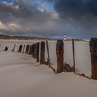 Metallbuhnen am Ellenbogen mit Blick auf den Leuchtturm von List