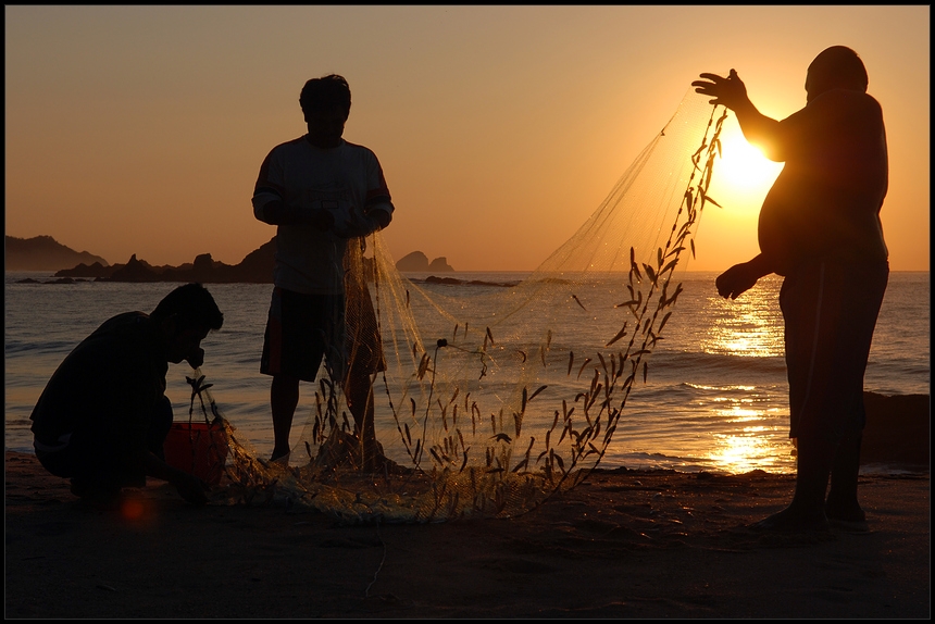 Mexikanische Fischer zum Sonnenaufgang