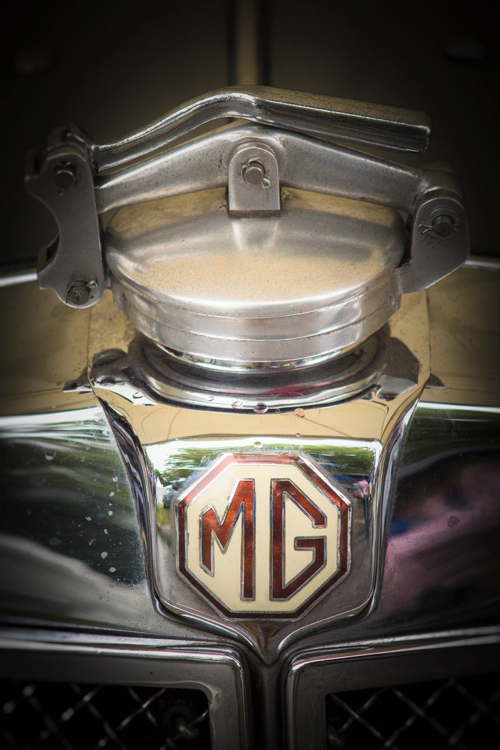 MG