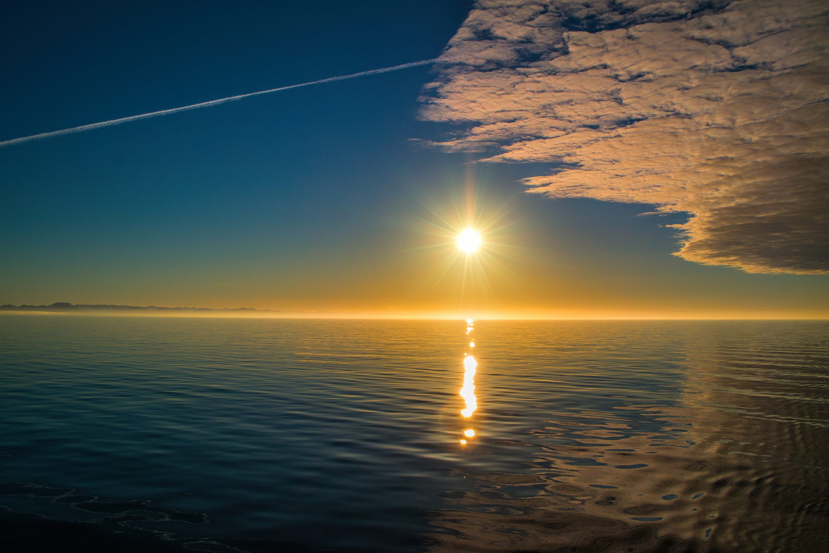 Midnight sun on the arctic sea