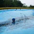 Minigolfen im Regen