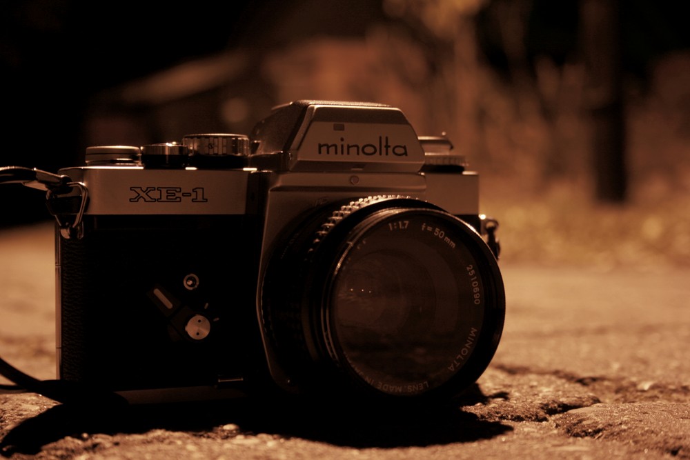 Minolta,..