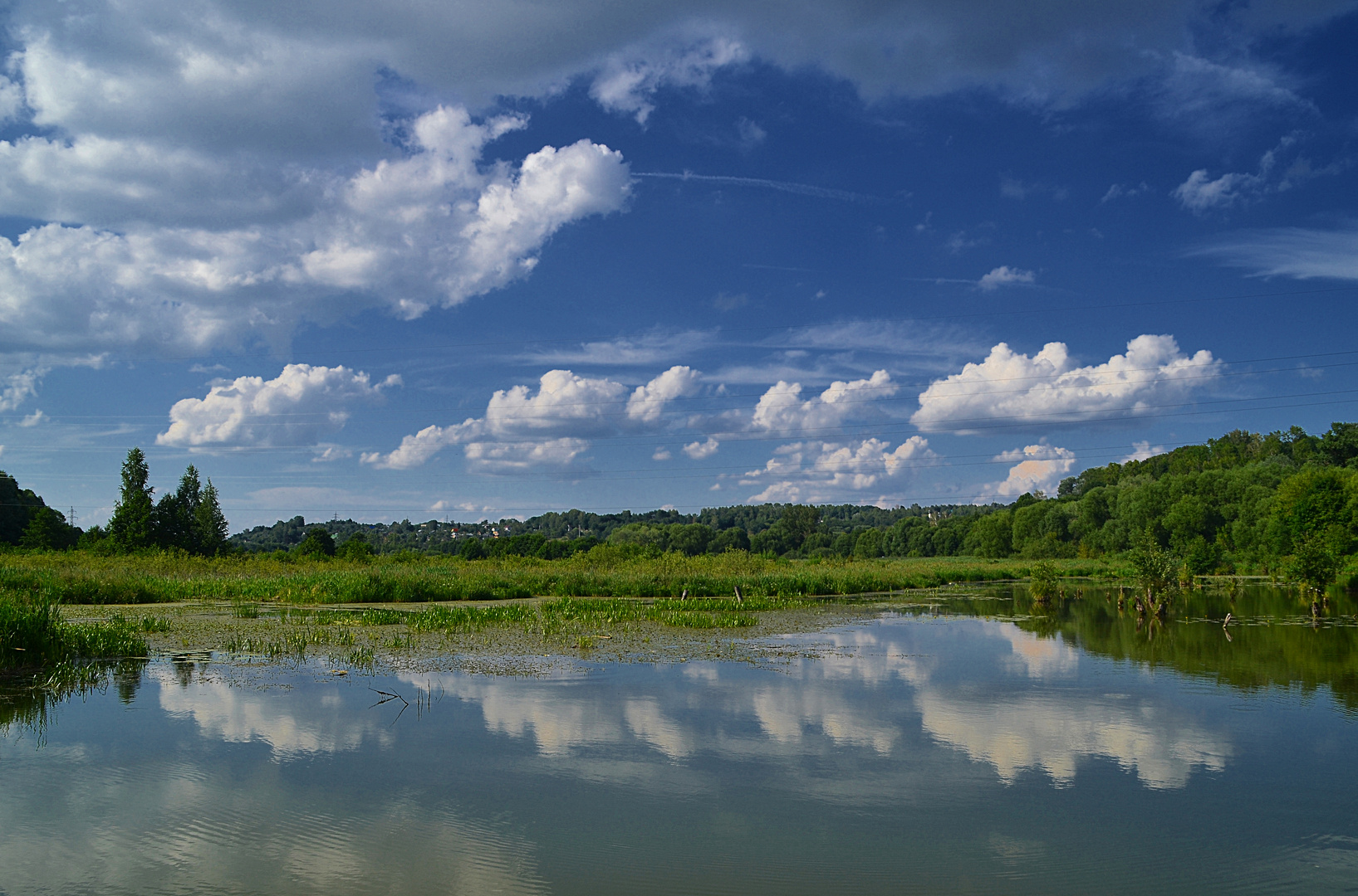 Mirror for the summer cloudscape