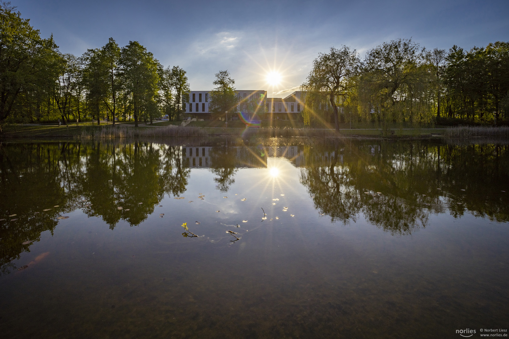 Mirror lake with sunstar